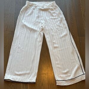 Anthropology, pull on-elasticized pants. Hemming repair in one side require H